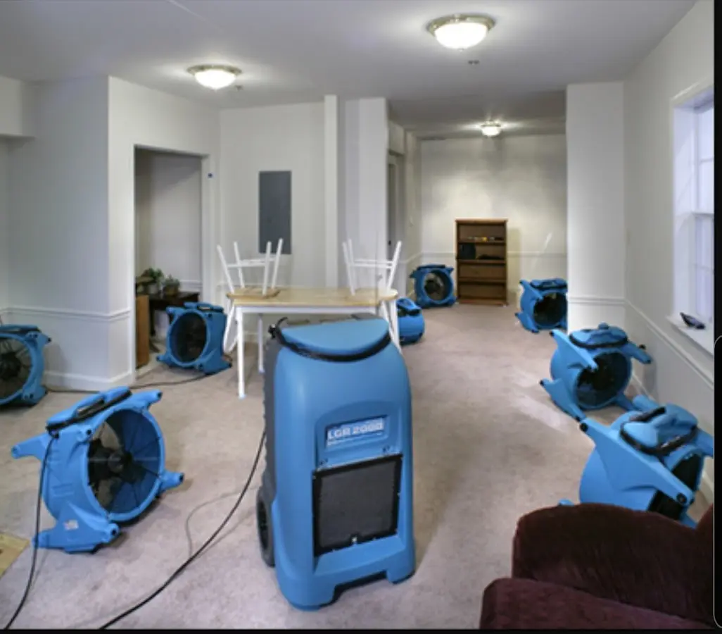 Air movers and dehumidifier setup for Water Damage Restoration in Seaside